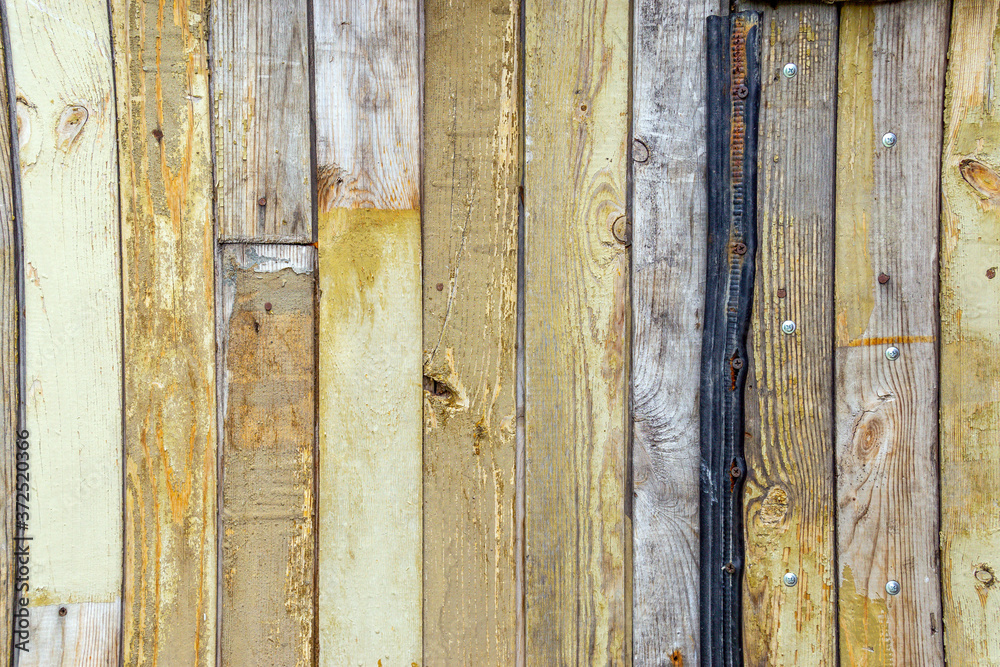 Brown wooden old scratched Board with knots. Wooden horizontal board texture. Brown wooden old scratched Board with knots. Wooden horizontal board texture.