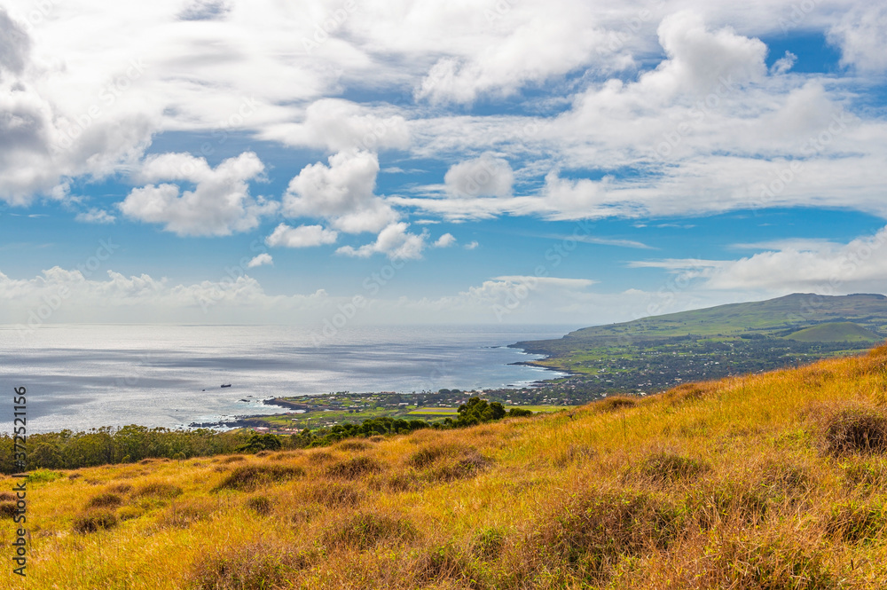 Aerial cityscape of Hanga Roa city and the Pacific Ocean from Rano Kau volcano, Easter Island (Rapa Nui), Chile. Aerial cityscape of Hanga Roa city and the Pacific Ocean from Rano Kau volcano, Easter Island (Rapa Nui), Chile.