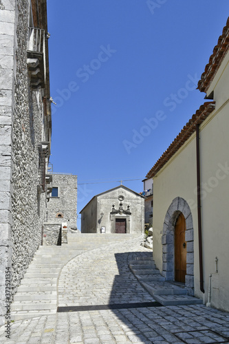 A narrow street among the old houses of Aieta, a rural village in the Calabria region. © Giambattista