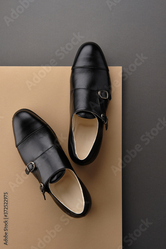 Male classic shoes. Elegant black monk shoes