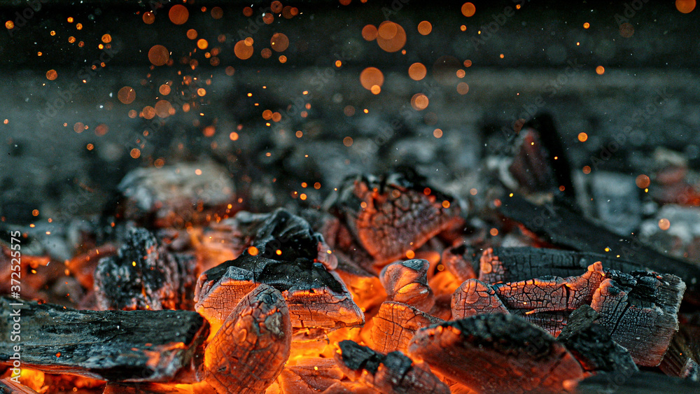 Barbecue Grill Pit With Glowing And Flaming Hot Charcoal Briquettes, Close-Up - obrazy, fototapety, plakaty 