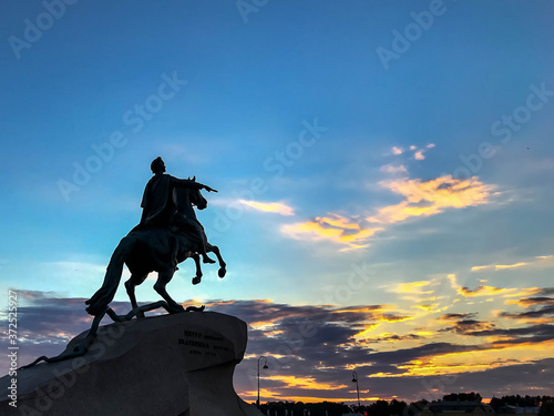 Bronze horseman monument illuminated sunset. Unique urban landscape center Saint Petersburg. View Neva River. Central historical sights city. Top tourist places in Russia. Capital Russian Empire