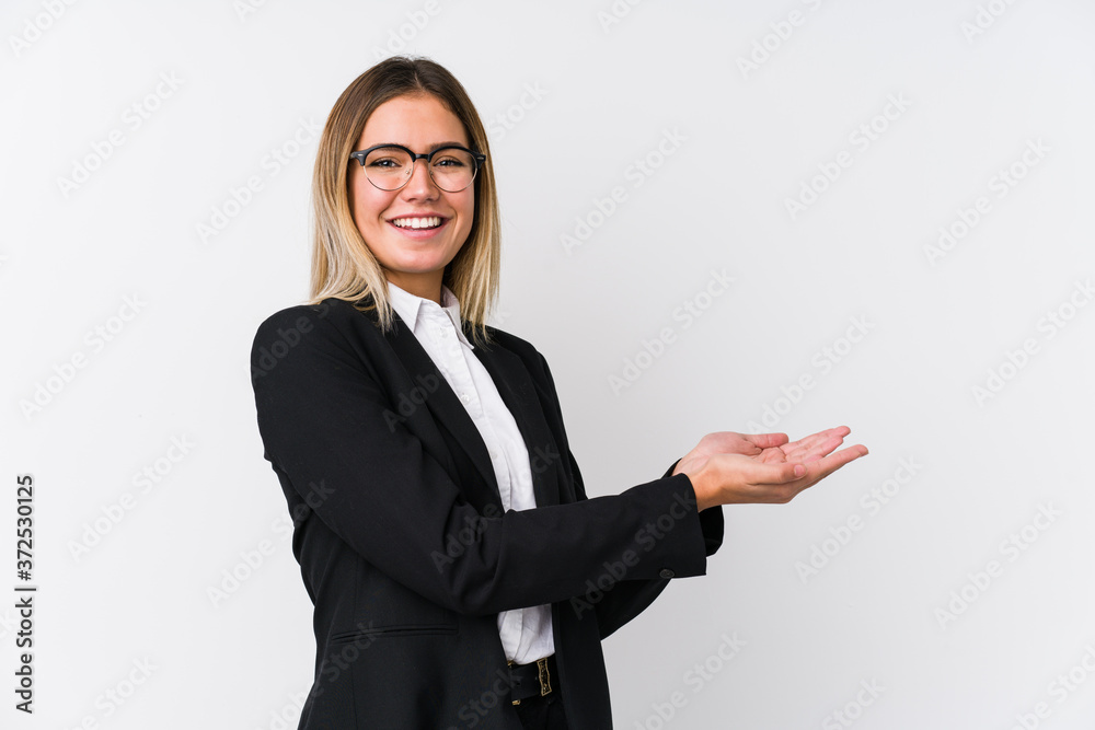 Young business caucasian woman holding a copy space on a palm. Young business caucasian woman holding a copy space on a palm.