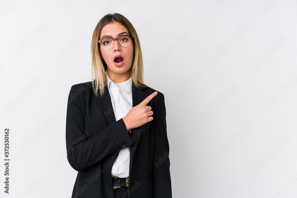 Young business caucasian woman pointing to the side Young business caucasian woman pointing to the side
