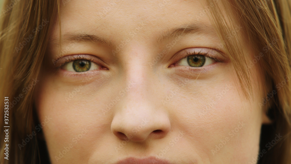 Close up face expression, Beautiful woman with green azzure eyes. Natural Beauty with Freckles. High quality photo Close up face expression, Beautiful woman with green azzure eyes. Natural Beauty with Freckles. High quality photo