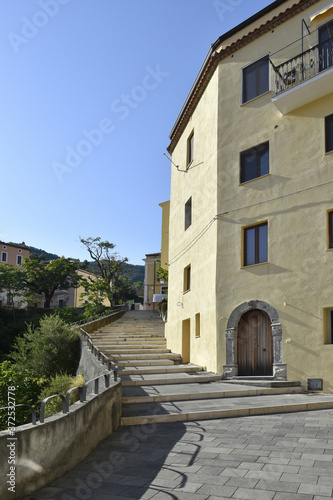 A narrow street among the old houses of Tortora  a rural village in the Calabria region  Italy.