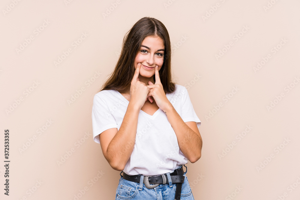 Young caucasian woman posing isolated doubting between two options. Young caucasian woman posing isolated doubting between two options.