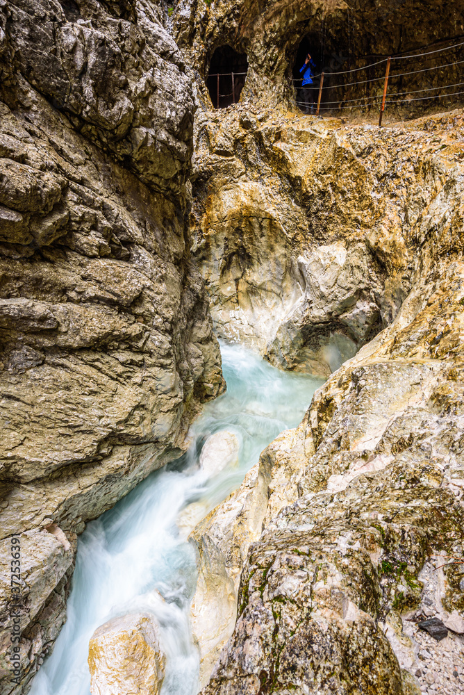 Obraz premium The Höllental, is one of the routes on the German side leading up the Zugspitze on the German-Austrian border in the northern Alps. It passes through a narrow gorge.