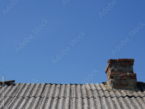 roof and chimney © Vitaly_MOKK