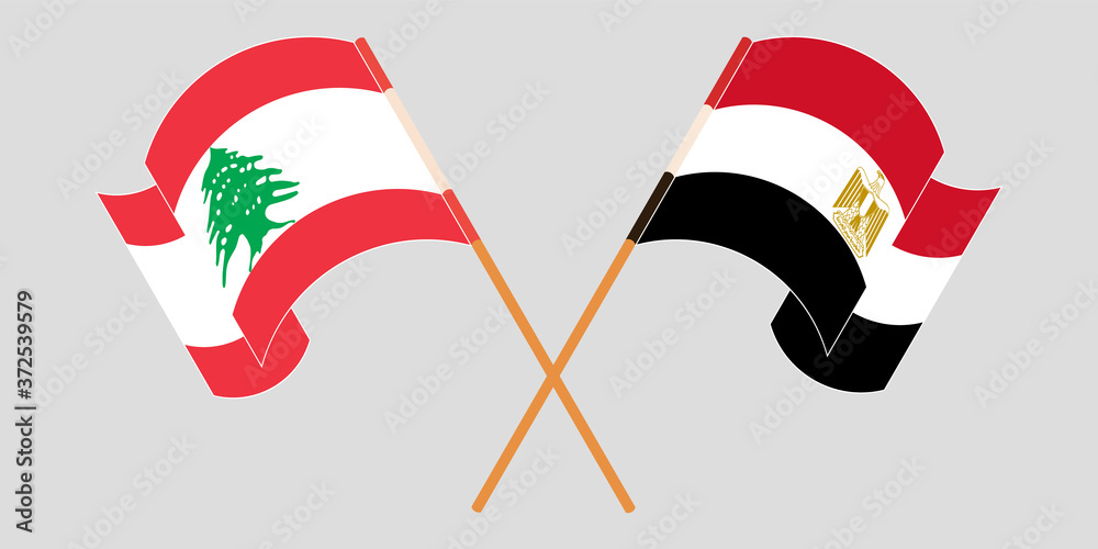 Crossed and waving flags of Lebanon and Egypt Crossed and waving flags of Lebanon and Egypt