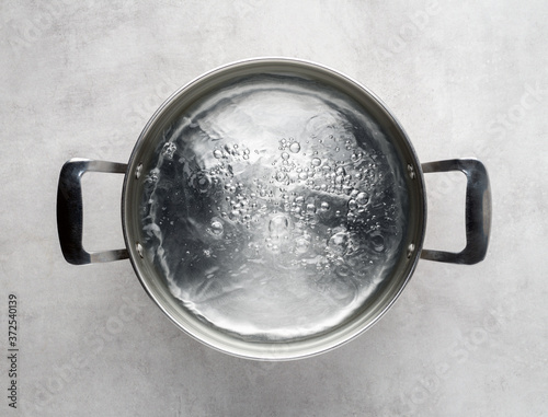 cooking pot of boiling water photo