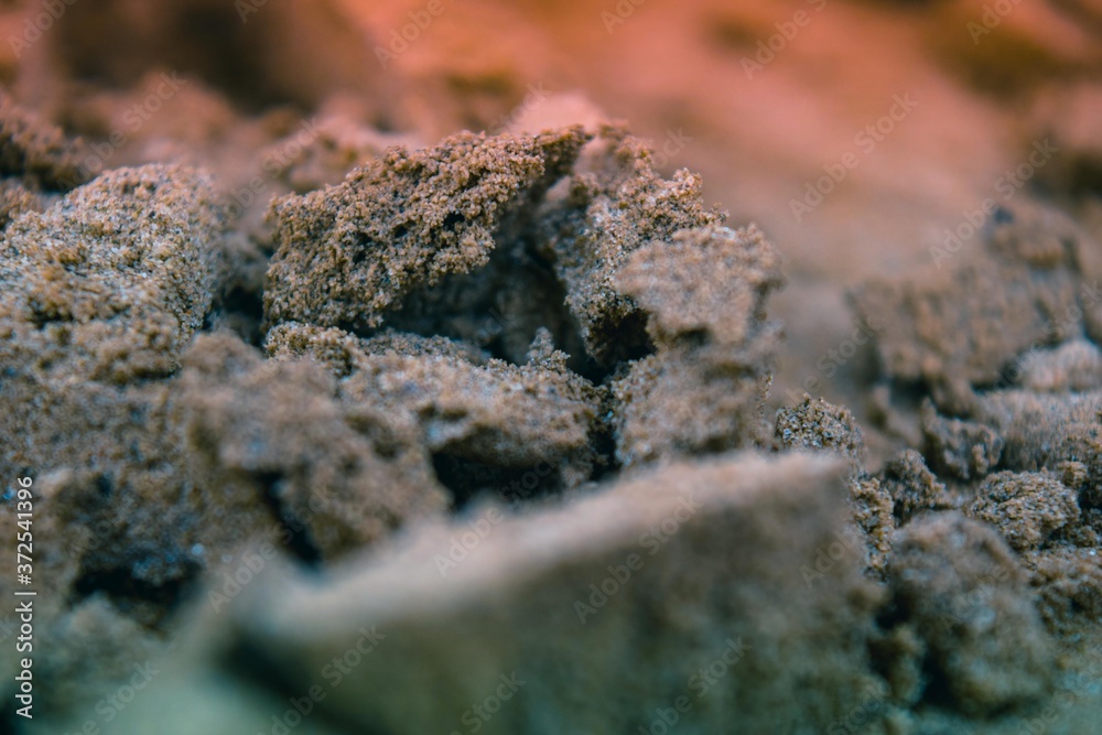 Close up shot of brown soil Close up shot of brown soil