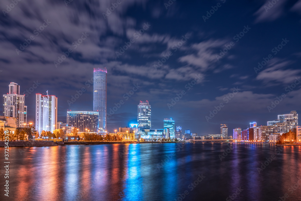 Fototapeta premium Autumn night on a pond in the center of the city Yekaterinburg, Russia.