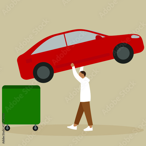 A man throws a car in a trash can