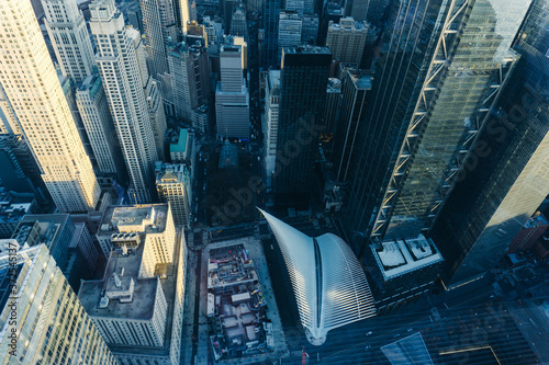 Photography Looking down from a skyscraper to Manhattan buildings and streets in financial d