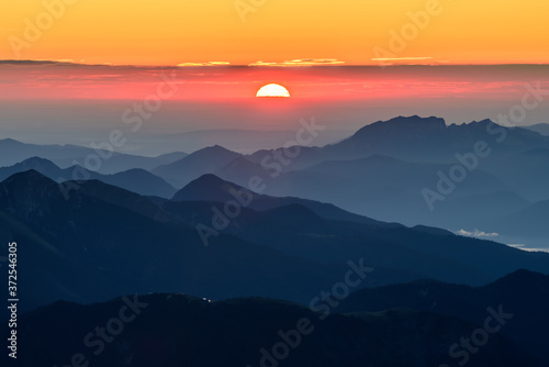 A picture of the sunrise over the alpine moutains range in Germanyfrom highest peak Zugspitze. 