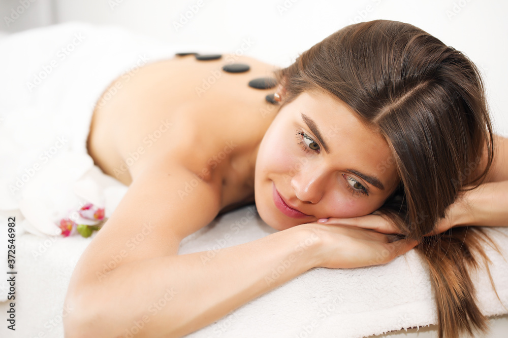Young, beautiful and healthy woman in spa salon. Traditional oriental aroma therapy and beauty treatments. Young, beautiful and healthy woman in spa salon. Traditional oriental aroma therapy and beauty treatments.