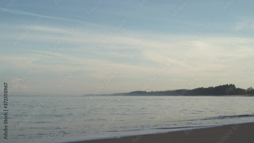 Phuket beach sea sand and sky. Landscape view of beach sea in summer day. The morning Beach bright. At , Phuket, Thailand. 4K UHD. Video Clip Phuket beach sea sand and sky. Landscape view of beach sea in summer day. The morning Beach bright. At , Phuket, Thailand. 4K UHD. Video Clip