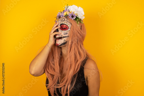 Charismatic carefree joyful friendly-looking outgoing woman likes laugh out loud not hiding emotions giggling hear funny hilarious joke chuckling facepalm close eyes smiling broadly white background