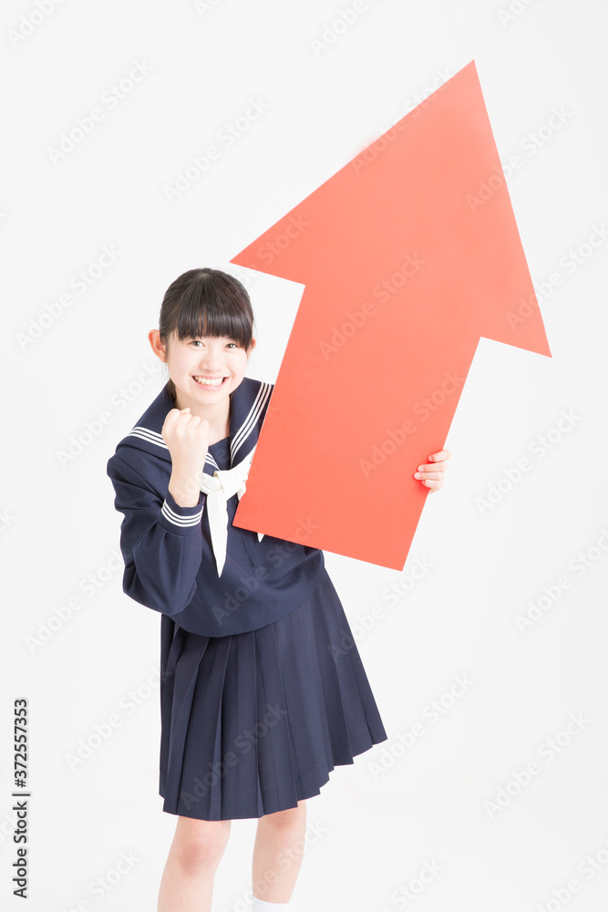 ガッツポーズをする女子中学生 ガッツポーズをする女子中学生