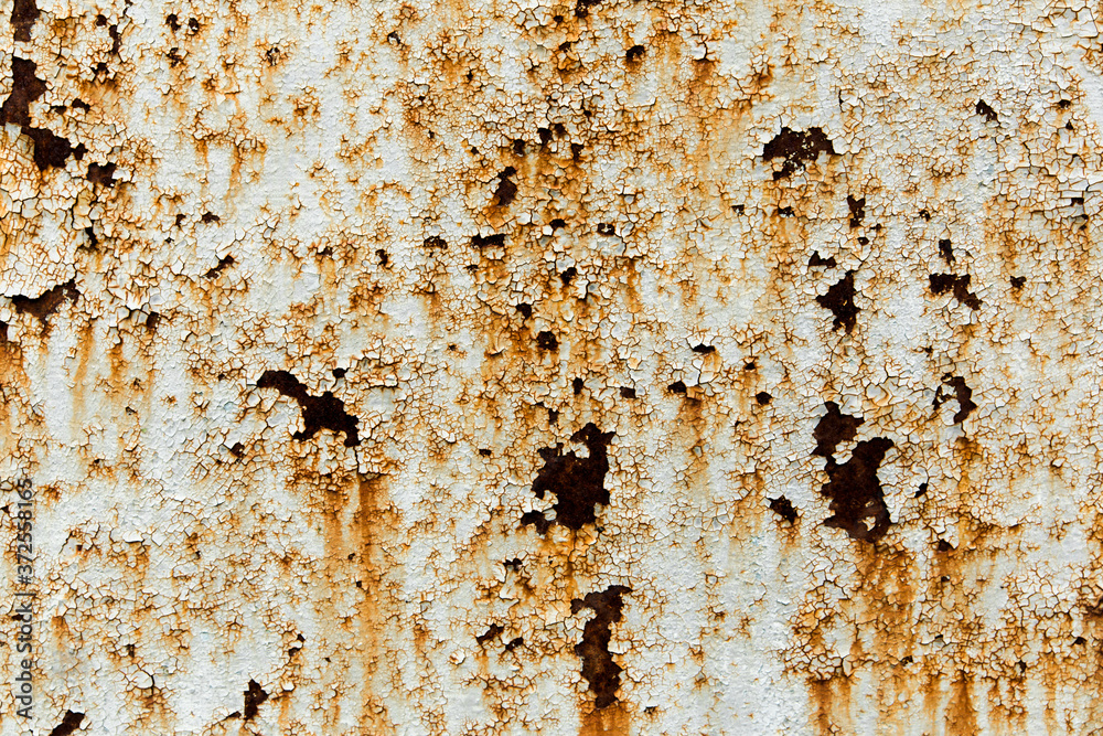 cracked paint old texture on the metal with rust.paint vintage background.old rusty metal with streaks of rust and cracked cracked paint old texture on the metal with rust.paint vintage background.old rusty metal with streaks of rust and cracked