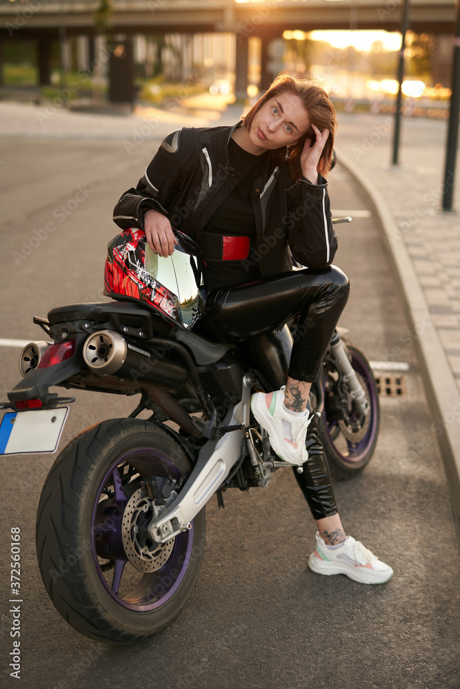 Young brunette girl in a black 