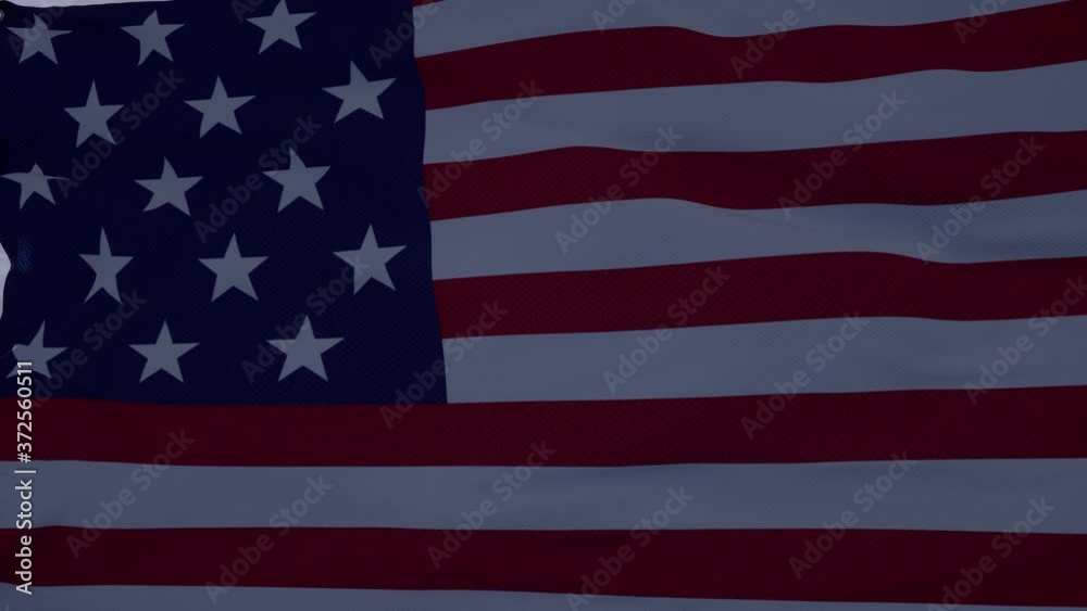 American flag waving in the wind. Realistic flag background