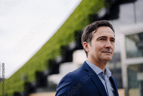 Portrait of a thoughtful mature businessman in the city