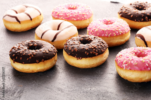 donuts in different glazes frosted with sprinkles