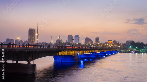 Egypt, Cairo, River Nile with Kasr El Nile Bridge and Gezira Island at sunset photo