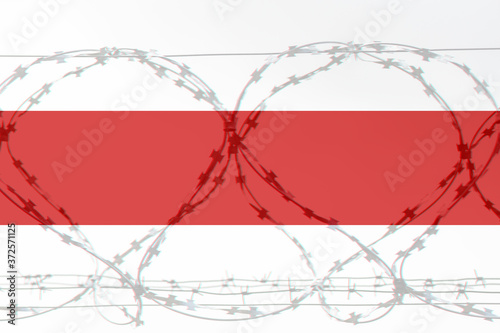 Belarus protest flag color over barbwire photo