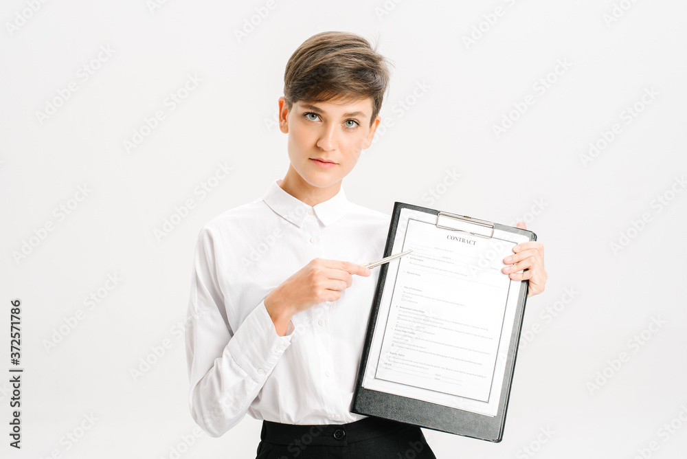 young brunette business woman in white shirt isolated on white background studio. Mock up copy space Hold clipboard with papers document young brunette business woman in white shirt isolated on white background studio. Mock up copy space Hold clipboard with papers document
