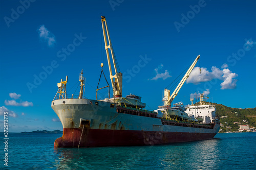 A cargo vessel moored of Road Town in Tortola