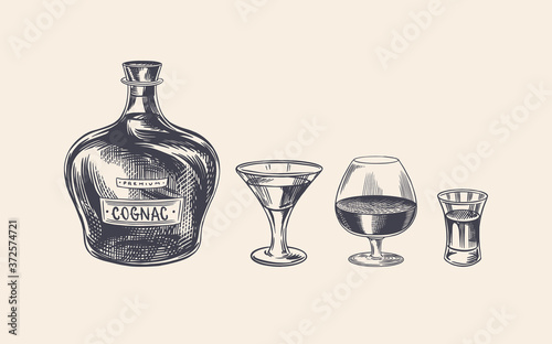 Cognac bottle and glass goblet. Engraved hand drawn vintage sketch. Woodcut style. Vector illustration.