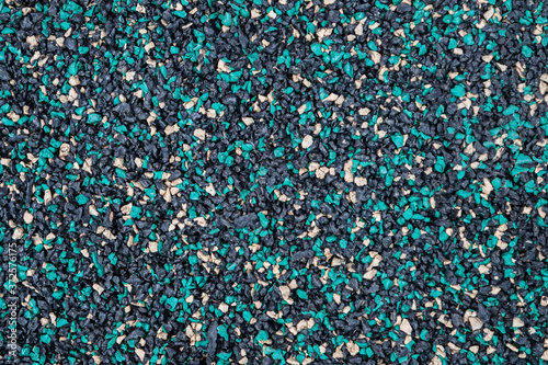 Canvas-taulu Texture of the street pavement of tracks made of rubber granular crumb