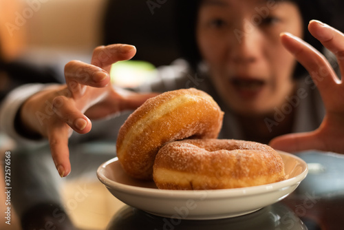 woman want to eat donut