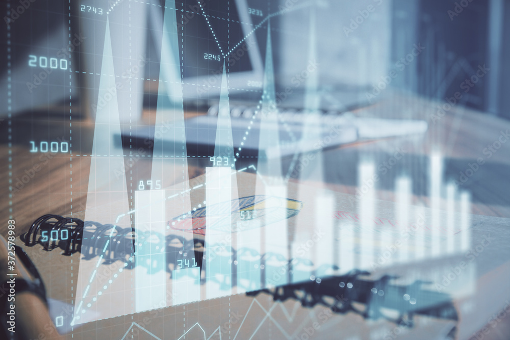 Fototapeta premium Double exposure of financial graph drawings and desk with open notebook background. Concept of forex market