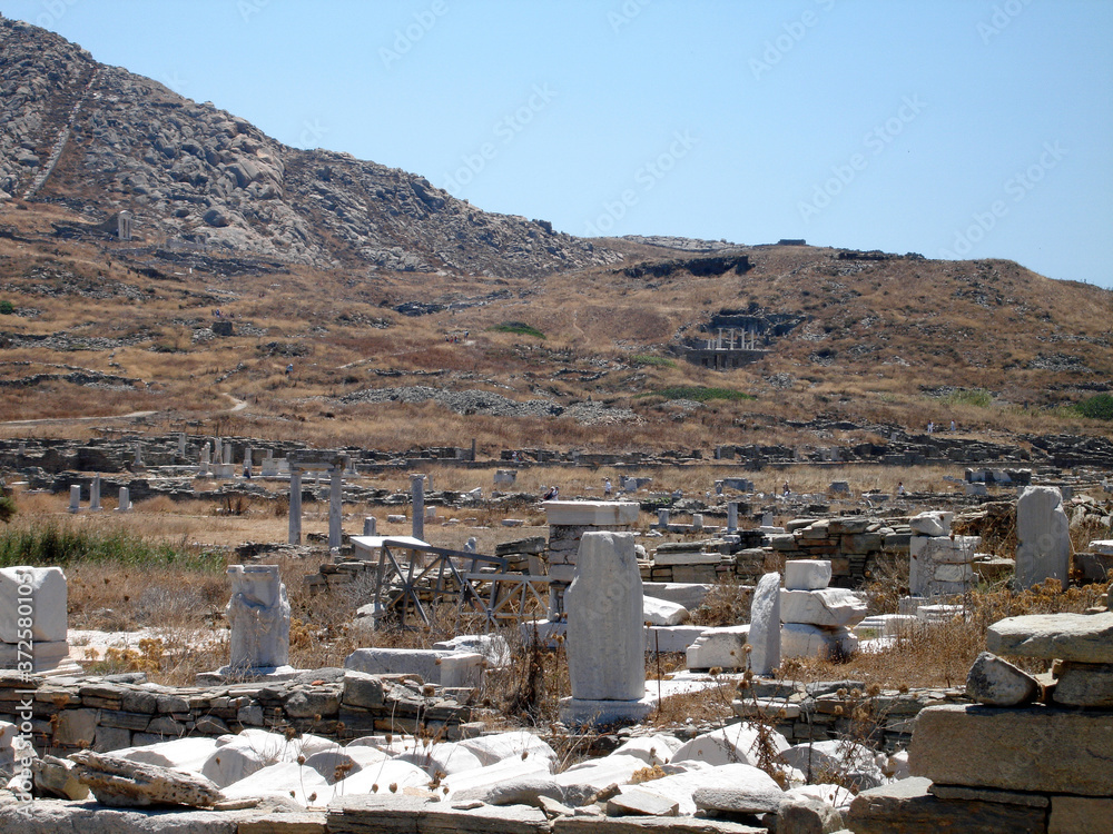 Delos Island, Greece, August 2020: The ancient Greek sacred island of Delos Delos Island, Greece, August 2020: The ancient Greek sacred island of Delos