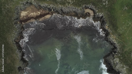 Asturias. Beautiful  coastal area in beach of Borizo.  Barro and  Celorrio. Spain. Aerial Drone Footage photo