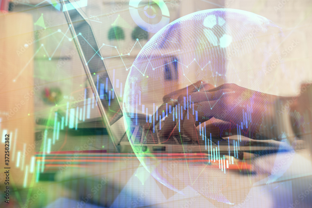 Double exposure of woman hands typing on computer and forex chart hologram drawing. Stock market invest concept. Double exposure of woman hands typing on computer and forex chart hologram drawing. Stock market invest concept.