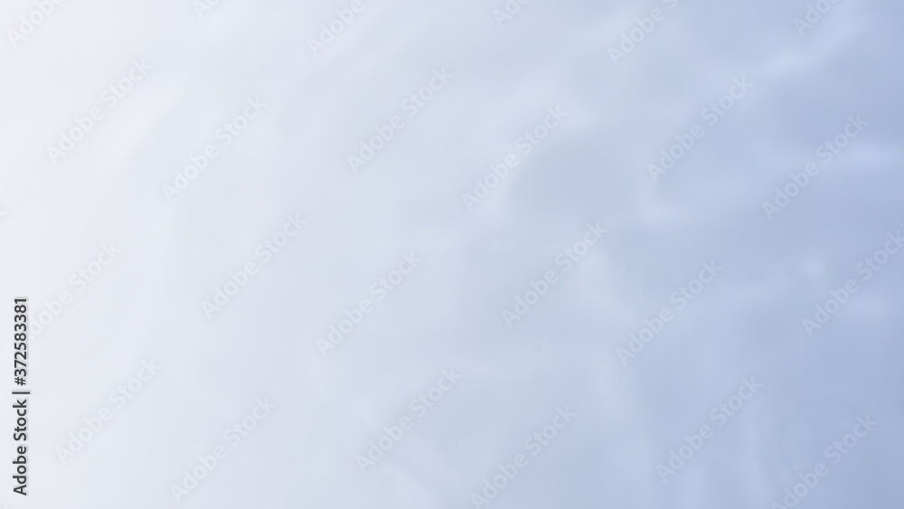 computer generated blurry ripple on the water surface background copy space . computer generated blurry ripple on the water surface background copy space .