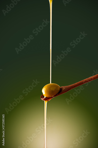 Drop of olive oil in a spon 