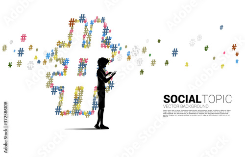 Silhouette of man use mobile phone and Hash tag background .concept for social media topic and news.
