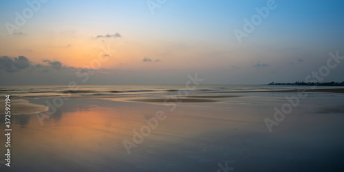 A beautiful sunrise over the beach © Brian