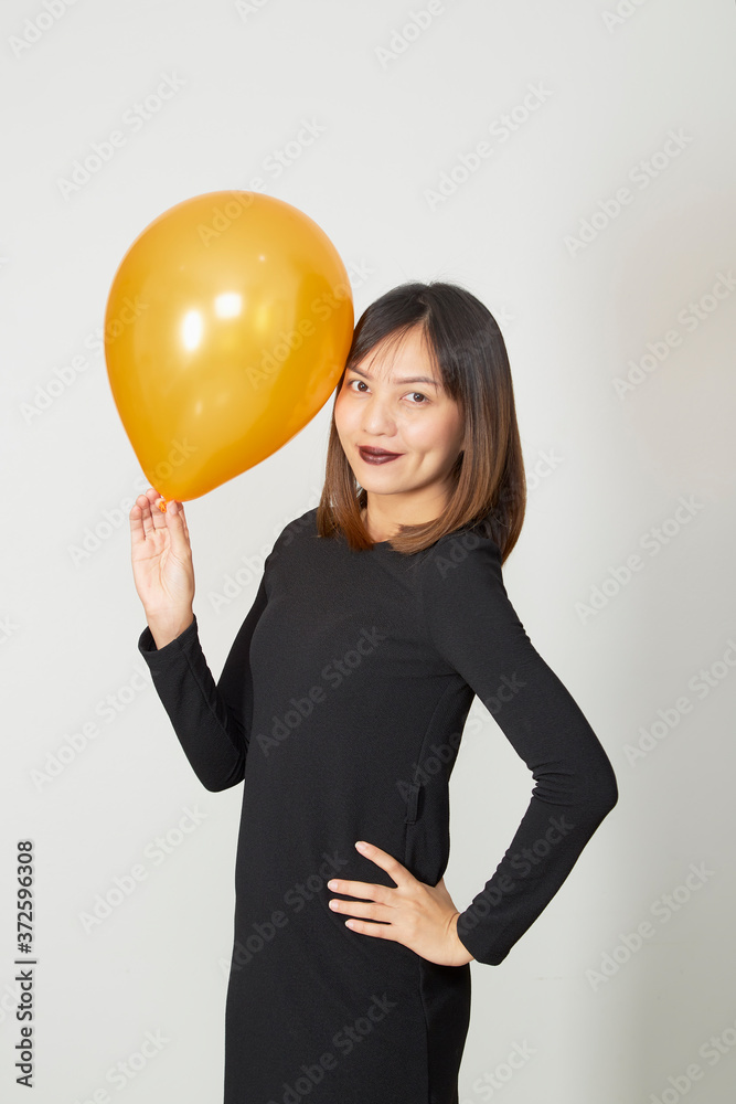 Happy Halloween Young woman in black witch costume Happy Halloween Young woman in black witch costume