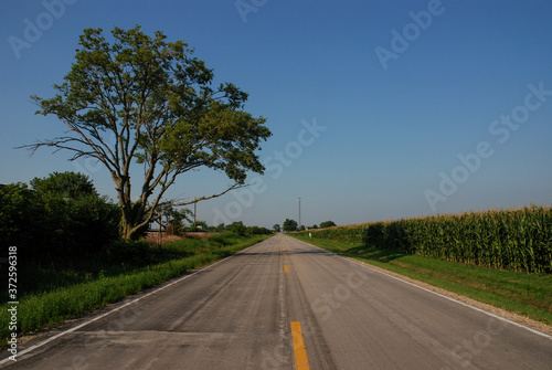 Route 66 along with corn field between Chicago and St Louis, Illinois. August 1, 2007.