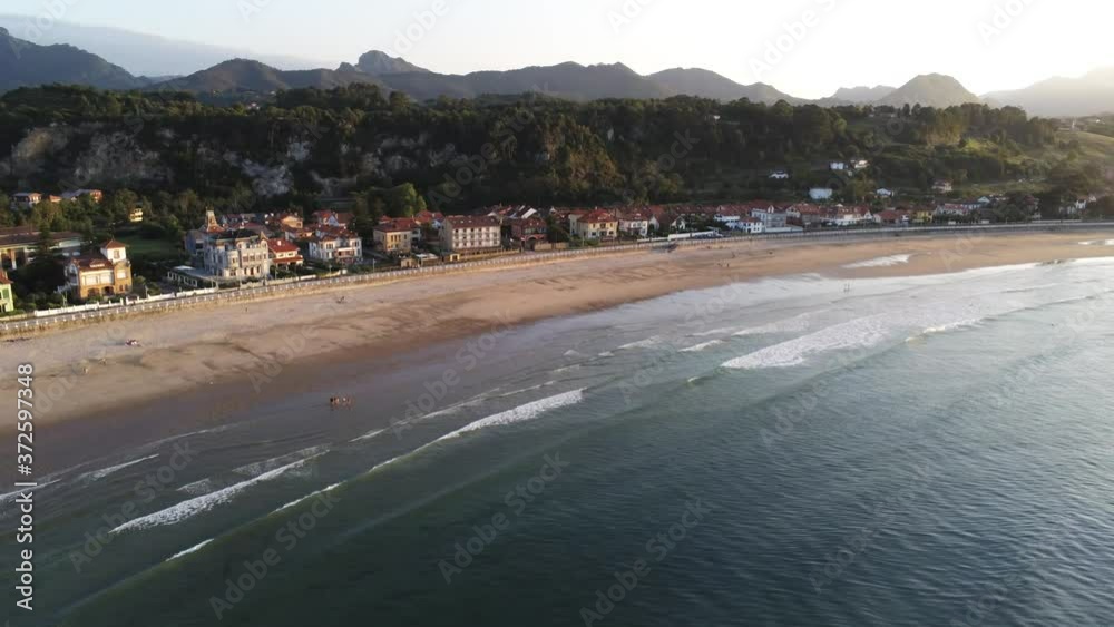 Beach in Ribadesella, coastal village of Asturias,Spain. Aerial Drone Footage Beach in Ribadesella, coastal village of Asturias,Spain. Aerial Drone Footage