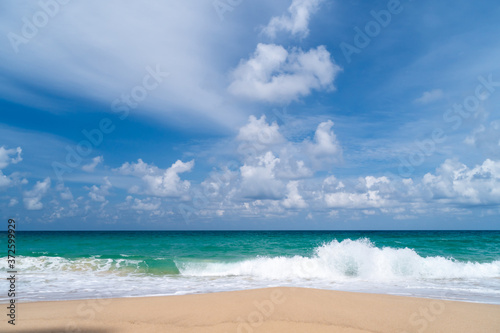 Tropical nature clean beach and white sand in summer with sun light blue sky and bokeh background.