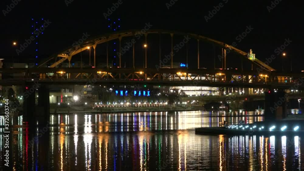 Downtown Pittsburgh Illuminated City Skyline PPG Building at Night Aerial with Water Reflection 4K Downtown Pittsburgh Illuminated City Skyline PPG Building at Night Aerial with Water Reflection 4K