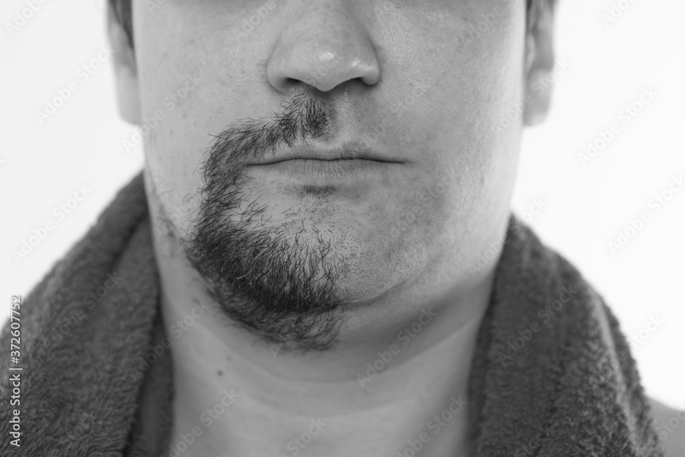 half of the beard close-up. morning treatments in the bathroom. copy space half of the beard close-up. morning treatments in the bathroom. copy space